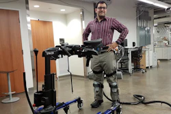 Professor Sharma wearing a lower-limb exoskeleton in his neuromuscular control and robotics laboratory.