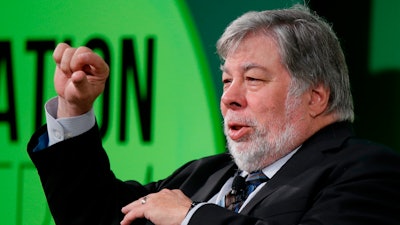 In this July 3, 2017, file photo, Apple co-founder Steve Wozniak gestures as he attends a conference titled 'The Innovation Summit' in Milan, Italy. Wozniak is shutting down his Facebook account as the social media giant struggles to cope with the worst privacy crisis in its history.