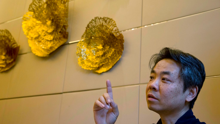 In this May 24, 2018, photo, Jiang Hui whose mother was on board the missing Malaysia airplane MH370 speaks to journalist about Texas-based company Ocean Infinity's search in Beijing, China. Australia said Tuesday that it was holding out hope that Malaysia Airlines Flight 370 would one day be found, as the last search by Ocean Infinity of the seabed in the remote Indian Ocean where the plane was believed to have been lost was scheduled to end Tuesday.