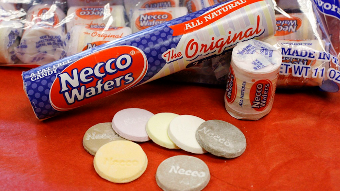 In this Oct. 14, 2009 file photo, Necco Wafers are displayed in Boston. Four bidders are vying to buy New England Confectionery Company, of Revere, Mass., the bankrupt manufacturer of Necco Wafers, Sweethearts and other iconic candies. A bankruptcy auction is scheduled for Wednesday, May 23, 2018. Necco said in March is will close and lay off hundreds of workers if a buyer isn't found. The company traces its roots to 1847 and calls itself the nation's oldest continuously operating candy company.