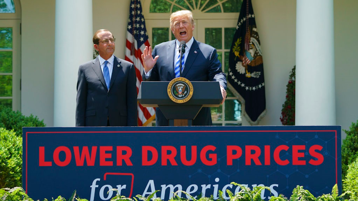 President Donald Trump speaks during an event about prescription drug prices with Health and Human Services Secretary Alex Azar in the Rose Garden of the White House in Washington, Friday, May 11, 2018.