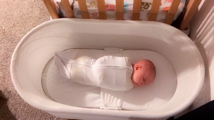 This Jan. 3, 2017 photo released by Paul Zalewski shows his infant daughter Ruby in a smart-tech sleeper called the Snoo, which gently rocks and jiggles babies to sleep from birth to 6 months old.