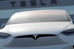 In this April 15, 2018, file photo, an unsold 2018 Model X 100d sits on a Tesla dealer's lot in the south Denver suburb of Littleton, Colo.