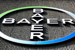 This Monday, May 23, 2016, file photo, shows the Bayer AG corporate logo displayed on a building of the German drug and chemicals company in Berlin. The German pharmaceutical giant has agreed, Tuesday, May 29, 2018, to the U.S. government's demand that it sell about $9 billion in agriculture businesses as condition for acquiring Monsanto Co., a U.S. seed and weed-killer maker.
