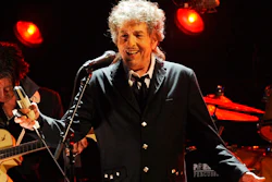 In this Jan. 12, 2012, file photo, Bob Dylan performs in Los Angeles. A distillery is partnering with Dylan to distill whiskey at a 140-year-old Tennessee church and bottle it under the name Heaven's Door. Media outlets reported Dylan partnered with Angel’s Envy Bourbon co-founder Marc Bushala in the venture.