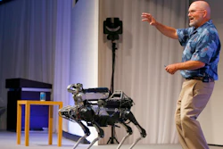 In this July 20, 2017 file photo, Boston Dynamics Chief Executive Marc Raibert speaks about his four-legged robot SpotMini during a SoftBank World presentation at a hotel in Tokyo. The robotics company known for its widely shared YouTube videos of nimble, legged robots opening doors or walking through rough terrain is finally preparing to sell some of them after years of research. Raibert said Friday, May 11, 2018, his company will begin selling the dog-like SpotMini robot next year, likely to businesses for use as a camera-equipped security guard. He made the announcement at a TechCrunch robotics conference at University of California, Berkeley.