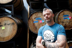 Jim Furman, CEO of Black Hammer Brewing, poses for photos in front of barrels in San Francisco, Thursday, May 24, 2018. U.S. officials have ordered the San Francisco brewery to stop producing beer containing cannabidiol, the hemp-derived extract known as CBD. The U.S. Alcohol and Tobacco Tax and Trade Bureau is allowing Black Hammer Brewing to sell the rest of the CBD beer it already brewed, including one called Toke Back Mountain.