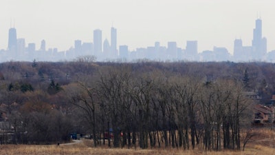 In this March 19, 2015, file photo, a thick haze of smog looms over the skyline of Chicago. A new study in the Proceedings of the National Academy of Sciences finds that America’s nitrogen oxides levels, a key ingredient in smog, aren’t falling as fast as they used to and may be leveling off. The Monday, April 30, 2018, study means that when tighter new air quality standards go into effect later this fall, more cities may find themselves on federal's dirty air list.