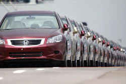 In this March 29, 2010 file photo, Japanese automaker Honda Motor Co.'s vehicles for export park at a Yokohama port, near Tokyo, Japan. China and Japan both condemned Thursday, May 24, 2018 the Trump administration's decision to launch an investigation into whether tariffs are needed on imports of vehicles and automotive parts into the United States.