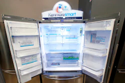 In this July 20, 2017, file photo, the Kenmore Elite Smart French Door Refrigerator appears on display at a Sears store in West Jordan, Utah. In a move announced Monday, May 14, Sears Holdings Corp. says a special committee of its board is starting a formal process to explore the sale of its Kenmore brand and related assets.