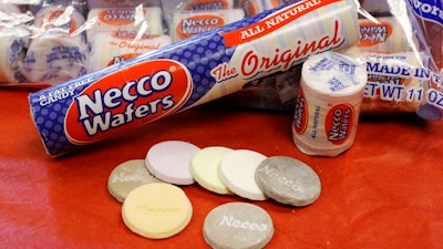 In this Oct. 14, 2009 file photo, Necco Wafers are displayed in Boston. Four bidders are vying to buy New England Confectionery Company, of Revere, Mass., the bankrupt manufacturer of Necco Wafers, Sweethearts and other iconic candies. A bankruptcy auction is scheduled for Wednesday, May 23, 2018. Necco said in March is will close and lay off hundreds of workers if a buyer isn't found. The company traces its roots to 1847 and calls itself the nation's oldest continuously operating candy company.