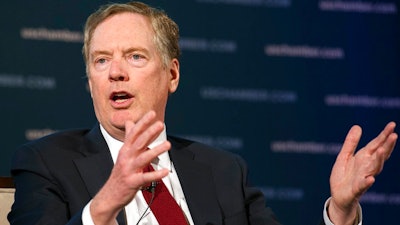 U.S. Trade Representative Robert Lighthizer speaks at the 9th China Business Conference at the U.S. Chamber of Commerce in Washington, Tuesday, May 1, 2018. The U.S. Chamber of Commerce and AmCham China are hosting the event. The U.S. has threatened to impose tariffs on $150 billion of Chinese goods in retaliation for what it argues are Beijing's unfair trade practices and its requirement that U.S. companies turn over technology in exchange for access to its market. China has said it would subject $50 billion of U.S. goods to tariffs if the U.S. taxes its products. A delegation led by Treasury Secretary Steven Mnuchin, Lighthizer and trade adviser Peter Navarro will visit Beijing for negotiations later this week.