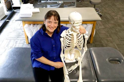 n this Saturday, May 12, 2018, photo, April Oury, owner of Body Gears physical therapy center poses for a portrait with her instructional skeleton in Chicago. Oury started her physical therapy practice 14 years ago wanting to give all aspects of her business the same focus and attention to detail she gave patients, even when it came to choosing paint colors or an internet provider. She wouldn’t do it that way again. “There was not enough time in the day or the workweek to put that kind of effort into every single thing,” says Oury.
