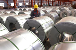 In this April 7, 2018, file photo, a worker checks on rolls of aluminum at a factory in Zouping county in east China's Shandong province. Small businesses are threatened by higher costs from U.S. steel and aluminum tariffs and by a broader trade fight with China, as steel costs are already higher since the Trump administration announced a 25 percent tariff on the metal in March.