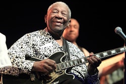 In this Aug. 8, 2013, file photo, Blues music legend B.B. King performs on Frampton's Guitar Circus 2013 Tour at Pier Six Pavilion, in Baltimore. The maker of the Gibson guitar, omnipresent for decades on the American music stage, is filing for bankruptcy protection after wrestling for years with debt. A pre-negotiated reorganization plan filed Tuesday, May 1, 2018, will allow Gibson Brands Inc. to continue operations with $135 million in financing from lenders.