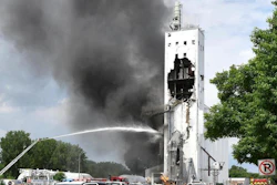 Emergency workers respond to the scene of a grain elevator explosion and fire near the intersection 4th Avenue and West 24th Street in South Sioux City, Neb., Tuesday, May 29, 2018.