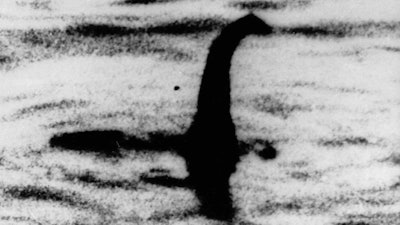 This is an undated file photo of a shadowy shape that some people say is a photo of the Loch Ness monster in Scotland. For hundreds of years, visitors to Scotland's Loch Ness have described seeing a monster that some believe lives in the depths. Now the legend of 'Nessie' may have no place to hide. Researchers will travel there next month to take samples of the murky waters and use DNA tests to determine what species live there.