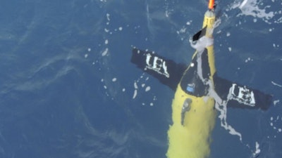 A Seaglider being deployed into the ocean.