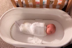 This Jan. 3, 2017 photo released by Paul Zalewski shows his infant daughter Ruby in a smart-tech sleeper called the Snoo, which gently rocks and jiggles babies to sleep from birth to 6 months old.