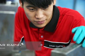 Star Rapid technician checks a plastic injection mold tool before installation.