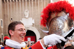 In this May 6, 2007 file photo, an unidentified Swiss Guard puts his helmet on the head of his girlfriend during a ceremony in the 'Honour Courtyard' at the Vatican. The world’s oldest standing army is getting some new headgear. The Swiss Guards plan to replace their metal helmets with plastic PVC ones made with a 3-D printer, giving the pope's army cooler and more comfortable headgear when standing guard for hours at a time.