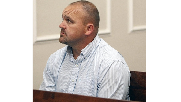 In a May 22, 2015 file photo, Gilbert 'Toby' Curtsinger sits Franklin County Circuit Court in Frankfort, Ky. Curtsinger, the ringleader of a whiskey theft operation in Kentucky was sentenced to 15 years in prison Friday, June 1, 2018 for his role in siphoning tens of thousands of dollars' worth of bourbon from a pair of distilleries.