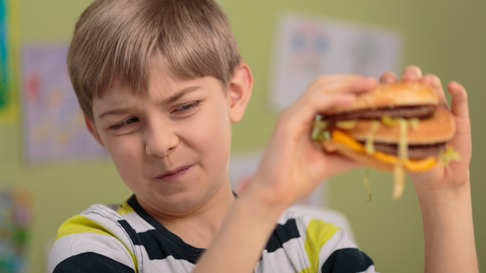 Boy Not Liking Burger