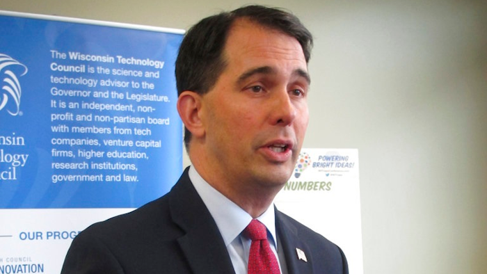 Wisconsin Gov. Scott Walker speaks at a news conference Wednesday, June 6, 2018, in Madison, Wis. He says news that the state will receive $160 million in federal funding for work on Interstate 94 between Milwaukee and Illinois will help ensure the project is complete by 2021.