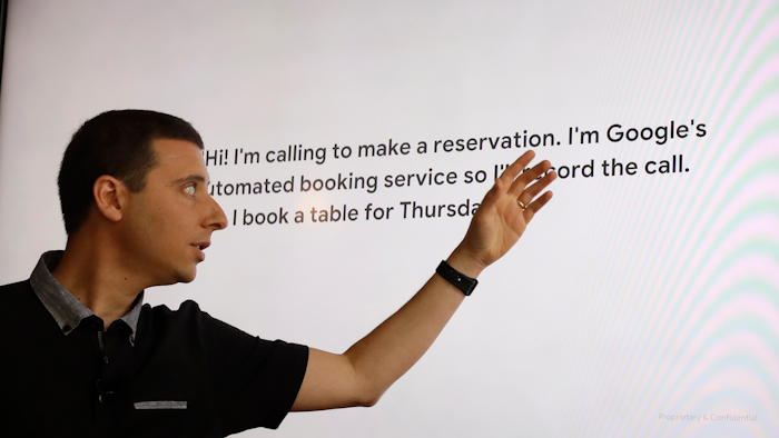 In this Tuesday, June 26, 2018, photo Nick Fox, VP of Assistant and Search for Google, talks about the Duplex program, which allows the user to book an appointment over the phone, at Oren's Hummus Shop in Mountain View, Calif.