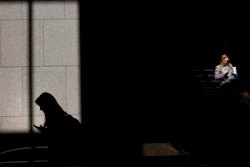 In this June 1, 2018, file photo, commuters look at their phones in Los Angeles. Technology giants like Facebook, Google and Amazon ask us to trust them with ever-more sensitive aspects of our lives, from our relationships to our private conversations. But there’s a catch: If they prove unworthy of that trust, the repercussions are scant and alternatives seem hard to find.