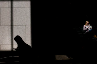 In this June 1, 2018, file photo, commuters look at their phones in Los Angeles. Technology giants like Facebook, Google and Amazon ask us to trust them with ever-more sensitive aspects of our lives, from our relationships to our private conversations. But there’s a catch: If they prove unworthy of that trust, the repercussions are scant and alternatives seem hard to find.