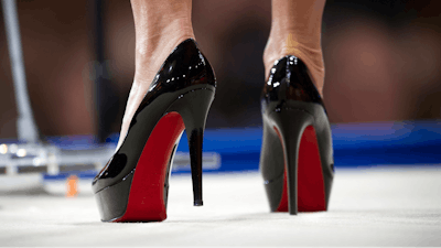 In this file photo dated Thursday, Feb. 26, 2015, former Alaska Gov. Sarah Palin wears Christian Louboutin shoes while she speaks during the Conservative Political Action Conference (CPAC) in National Harbor, Md., U.S.A.. The European Union’s top court has ruled Tuesday June 12, 2018, defending French fashion designer Christian Louboutin’s claim to trademark red soled high-heel shoes.