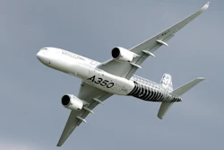 In this Wednesday, April 25, 2018 file photo, an Airbus A350 flies during the ILA Berlin Air Show in Berlin, Germany. Aviation giant Airbus has threatened to leave Britain if the country leaves the European Union without an agreement on future trading relations.