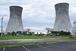 Two cooling towers of the St. Johns River Power Park in Jacksonville, Fla., are simultaneously imploded Saturday, June 16, 2018, as part of the demolition of the now closed coal fired power plant operated by the Jacksonville Electrical Authority.