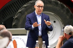 Environmental Protection Agency Administrator Scott Pruitt addresses farmers during a forum at a farm near Reliance, S.D. Farmers and ethanol producers gave Pruitt a rough reception in South Dakota, accusing him of undermining the industry that's a key part of the state's economy.