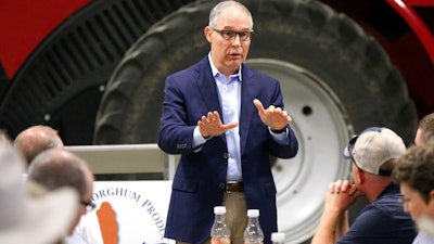 Environmental Protection Agency Administrator Scott Pruitt addresses farmers during a forum at a farm near Reliance, S.D. Farmers and ethanol producers gave Pruitt a rough reception in South Dakota, accusing him of undermining the industry that's a key part of the state's economy.