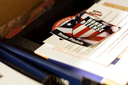 In this April 25, 2018, photo, literature is on display on the factory floor of Honor Defense, a gunmaker in Gainesville, Ga. In the wake of high-profile mass shootings, corporate America has been taking a stand against the firearms industry amid a lack of action by lawmakers on gun control. The moves are lauded by gun-safety advocates but criticized by the gun industry that views them as a backhanded way of undermining the Second Amendment. Gun industry leaders see the backlash as a real threat to their industry and are coming to the conclusion that they need additional protections in Congress to prevent financial retaliation from banks.