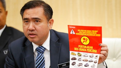 Malaysian Minister of Transport Anthony Loke speaks during a press conference in Putrajaya, Malaysia, Tuesday, June 5, 2018. Malaysia's Transport Minister says the government will take on an active role in an auto recall to replace flawed Takata air bags after data from eight car manufacturers showed that more than 350,000 car owners have not responded.
