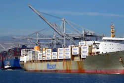 In this March 12, 2018, file photo, a tugboat assists a container ship in docking at the Port of Oakland in Oakland, Calif. President Donald Trump announced Friday, June 15, 2018, that starting next month the U.S. will impose a 25 percent tariff on up to $50 billion in Chinese imports.