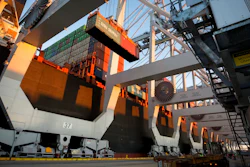 In this Jan. 30, 2018, file photo, a ship to shore crane loads two shipping containers together onto a vessel at the Georgia Ports Authority's Port of Savannah in Savannah, Ga. China's government renewed its threat Thursday, June 14, to scrap deals with Washington aimed at defusing a sprawling trade dispute as the White House prepared to release a list of Chinese goods targeted for tariff hikes.