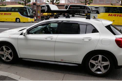 In this May 31, 2018, photo, a car is equipped with sensors to create 3D digital mapping in Tokyo. Technology companies are racing to develop ultra-precise three-dimensional digital maps that can guide self-driving cars to within inches of where they are supposed to be _ a hurdle the industry needs to clear if it hopes to deliver on its promise of widespread use of driverless vehicles.