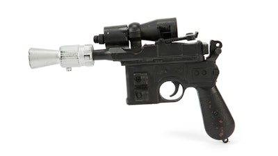This photo provided by Julien's Auctions shows character Han Solo's BlasTech DL-44 blaster from the Star Wars trilogy film 'Return of the Jedi' (Lucasfilm, 1983) that sold for $550,000 at Julien's Auctions Hollywood Legends auction at Planet Hollywood Resort & Casino, in Las Vegas, on Saturday, June 23, 2018. Julien’s Auctions say Ripley’s Believe It Or Not purchased the sci-fi weapon.