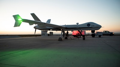 Aircraft maintenance crews at NASA‘s Armstrong Flight Research Center prepare the remotely-piloted Ikhana aircraft for a test flight June 12, 2018. The test flight was performed to validate key technologies and operations necessary for the Federal Aviation Administration's approval to fly the aircraft in the public airspace without a safety chase aircraft.
