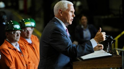 Vice President Mike Pence speaks to employees of Nucor Steel Auburn Inc. after a tour of the facility in Auburn, N.Y., Tuesday, June 19, 2018.