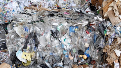 In this July 25, 2017 file photo, baled plastics await pickup for recycling inside the Athens-Clarke material recycling facility in Athens, Ga. A scientific study published Wednesday, June 20, 2018, said China's 2017 decision to stop accepting plastic waste from other countries is causing plastic to stockpile around the globe.