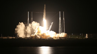 A SpaceX Falcon 9 rocket launches just before dawn Friday, June 29, 2018 at Launch Complex 40 at Cape Canaveral, Fla. The used Falcon rocket blasted off before dawn, hauling nearly 6,000 pounds (2,700 kilograms) of cargo, including the spherical AI bot named Cimon; genetically identical mice, or mousetronauts; and super-caffeinated coffee for the crew of the International Space Station. The shipment, packed into a Dragon capsule that's also recycled, should reach the station Monday.