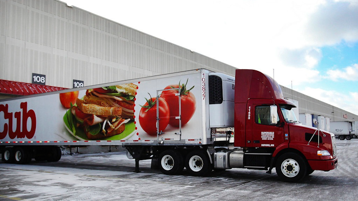 In this Jan. 23, 2013 photo, trailers line up at the loading docks at the Supervalu distribution center in Hopkins, Minn. United Natural Foods is buying Supervalu for $1.26 billion, creating a grocery food wholesaler with a diverse customer base. United Natural Foods of Providence, R.I., said Thursday, July 26, 2018, it's paying $32.50 per share in cash, or a premium of 67 percent, for each share of Supervalu Inc. Including the assumption of debt, the deal is valued at nearly $3 billion.