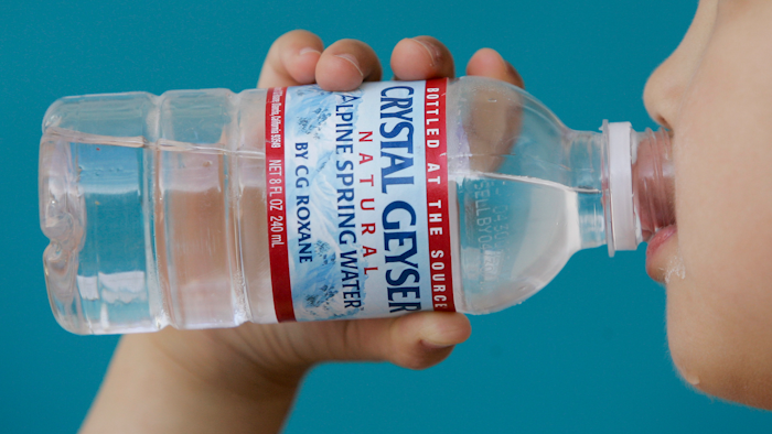 Federal prosecutors in Los Angeles announced charges Thursday, July 19, 2018, against the company that bottles Crystal Geyser water and two companies that transported and dumped the toxic waste. Prosecutors say the companies failed to disclose the contents on shipping manifests and it was taken to a facility not permitted to treat hazardous waste.