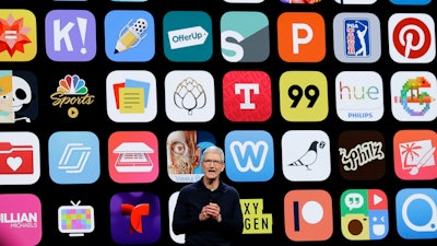 In this Monday, June 4, 2018 file photo, Apple CEO Tim Cook speaks during an announcement of new products at the Apple Worldwide Developers Conference in San Jose, Calif. Since its debut 10 years ago Tuesday, July 10, 2018, Apple’s app store has unleashed new ways for us to work, play, and become lost in our screens.