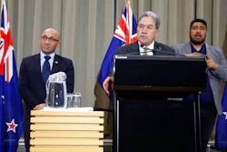 New Zealand's Acting Prime Minister Winston Peters, center, and Defense Minister Ron Mark, left, talk to reporters in Wellington, New Zealand Monday, July 9, 2018. They announced that New Zealand has agreed to buy four Boeing maritime patrol planes from the U.S.